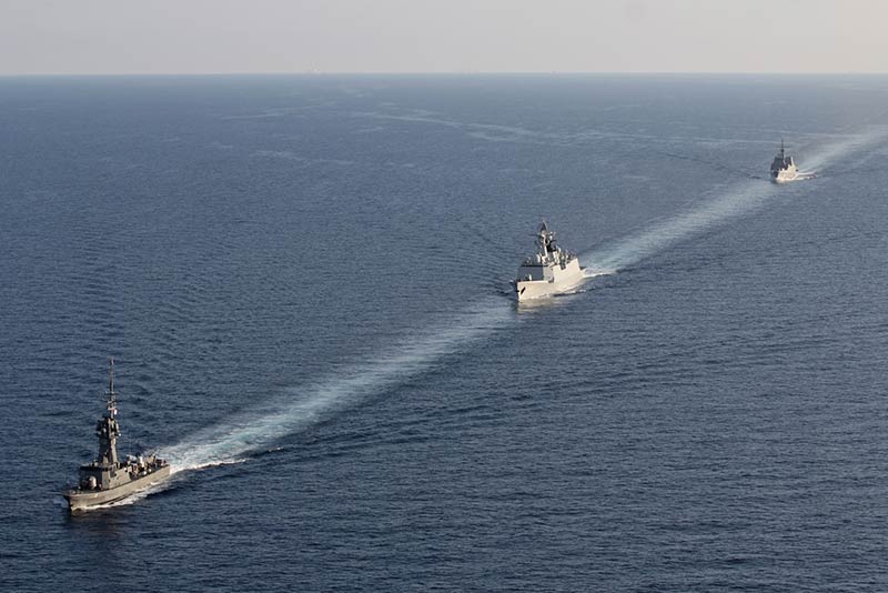 The RSN's RSS Valiant (left) and RSS Intrepid (right) participating in a manoeuvring exercise with the PLA(N)'s Yulin (middle). (Photo Courtesy of PLA[N])