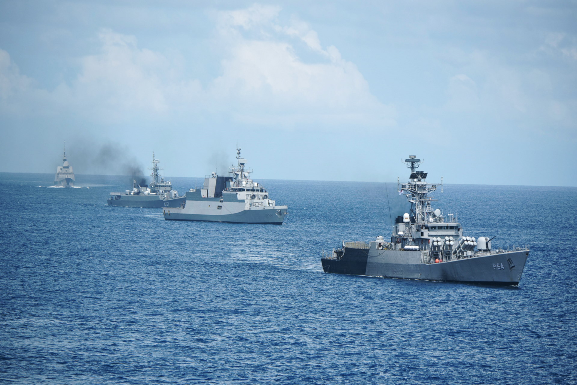The Republic of Singapore Navy, Indian Navy and Royal Thai Navy conducting manoeuvring drills during SITMEX 2020