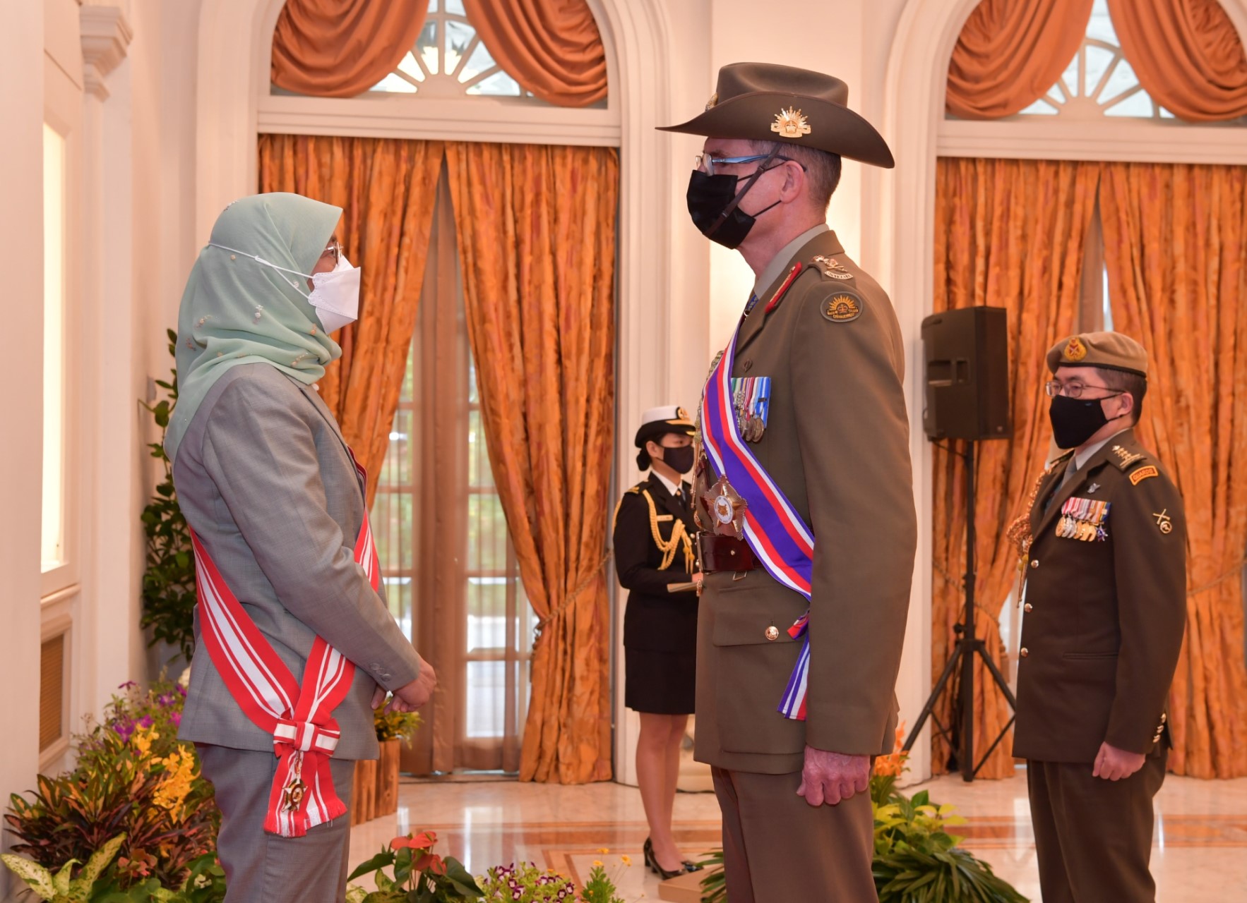 The Chief of the Australian Defence Force General (GEN) Angus Campbell with President Halimah Yacob after receiving the Distinguished Service Order (Military) award at the Istana.
