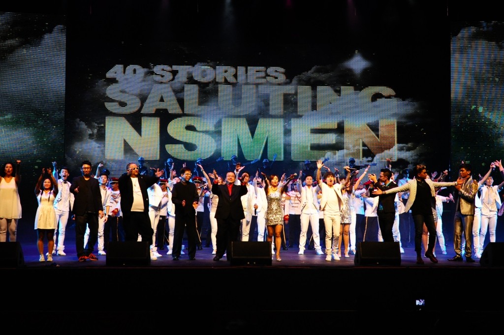 The full cast of 40 Stories: Saluting NSmen during the curtain call.