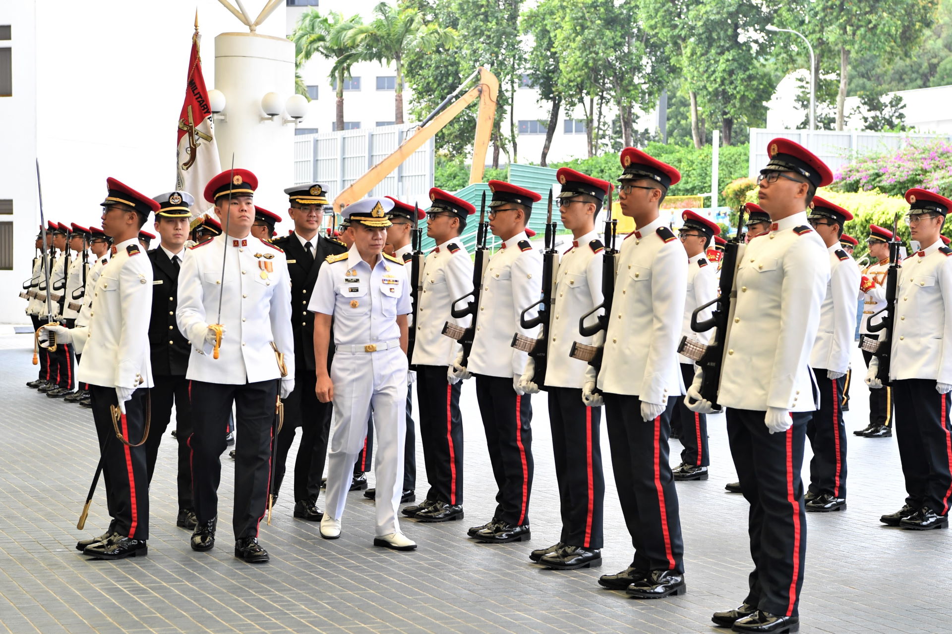 Commander-in-Chief of the Royal Thai Navy Admiral Luechai Ruddit reviewing a Guard of Honour at the Ministry of Defence (MINDEF) earlier this morning.