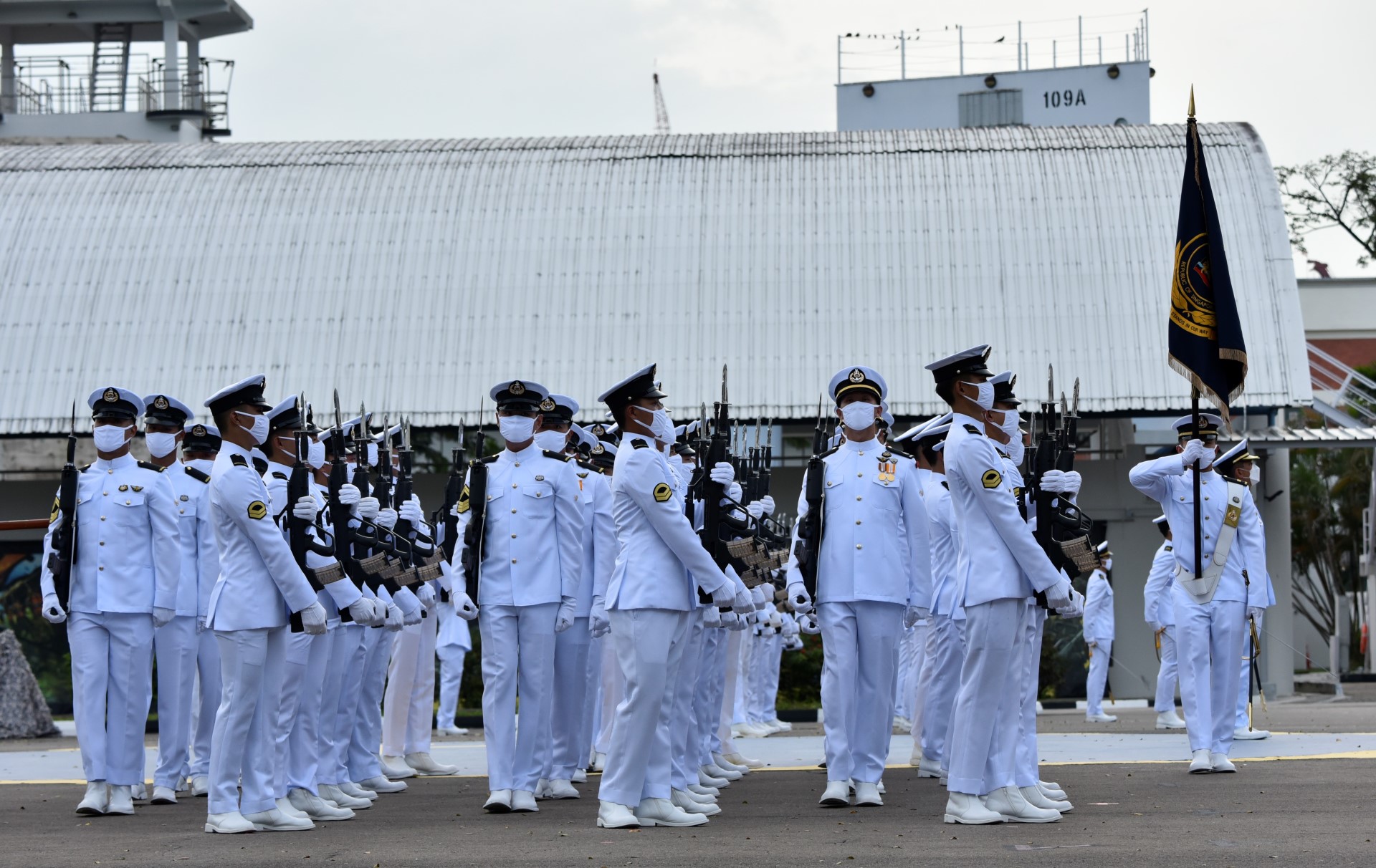 Trooping of colours by the parade contingent to commemorate NDU's golden jubilee milestone.