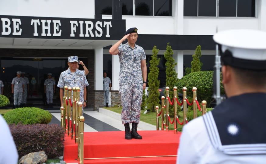 RADM Lim being welcomed with a Guard-of-Honour at Lumut Naval Base.