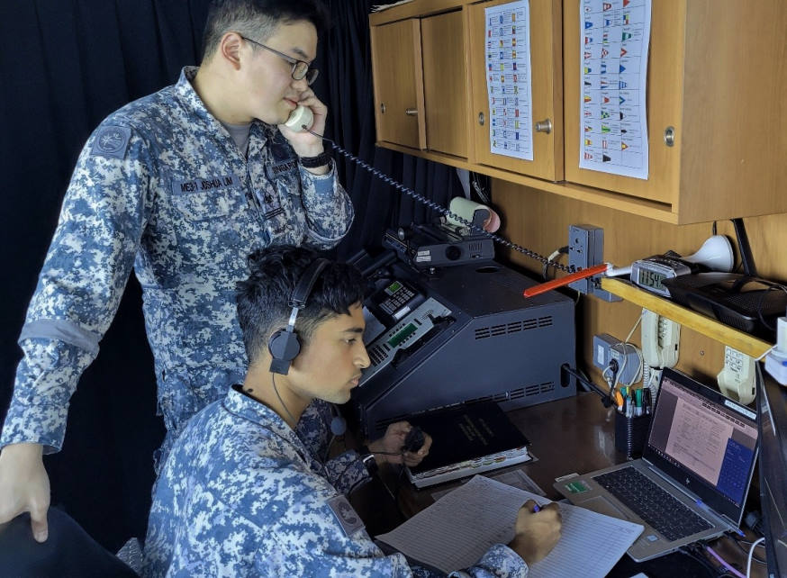 RSS Tenacious' Communication Systems Experts listening carefully during the publication exercise (PUBEX) serial. It's a test of how well they understand the coded signals found in communication publications that military ships use!