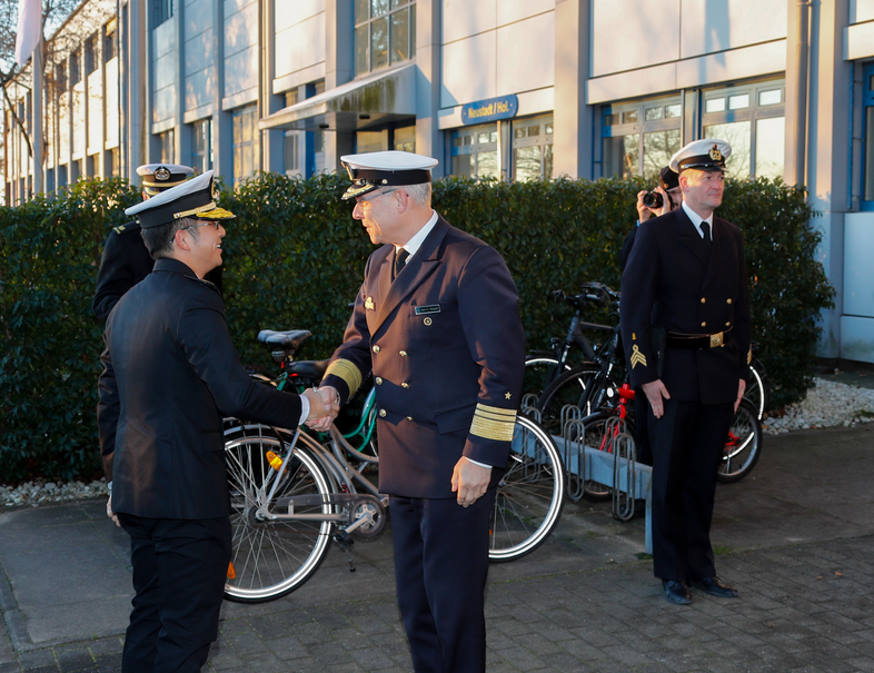 Chief of German Navy VADM Jan Christian Kaack (right) warmly welcomes Chief of Navy RADM Aaron Beng (left) at the Eckernförde Naval Base.