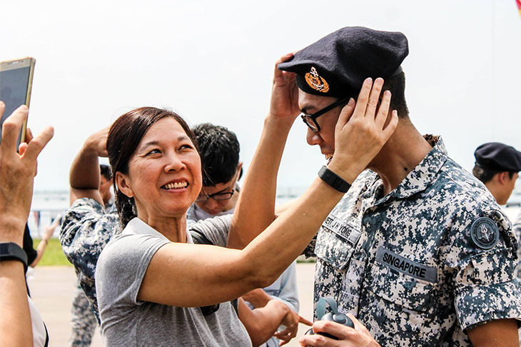 Singapore Navy soldier with woman