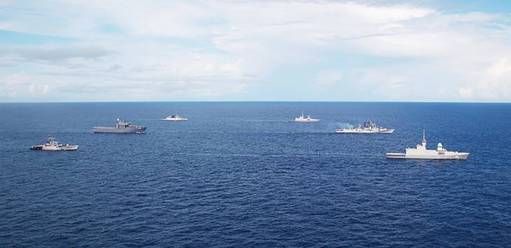 The Republic of Singapore Navy and Indian Navy sailing in formation during SIMBEX 2020.