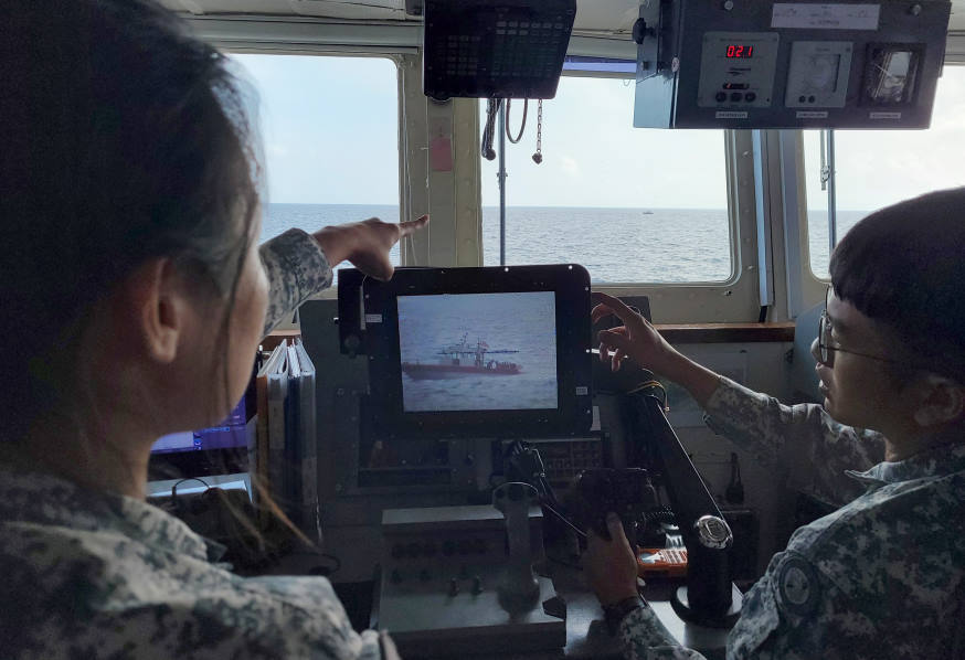 MSRV Bastion's bridge team maintaining a visual lookout while USCGC Stratton's rigid hull boat (RHB) recovered the man overboard during the Search and Rescue Exercise.