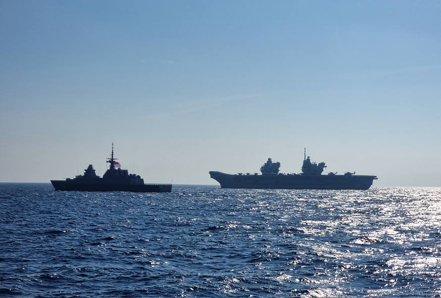 RSS Formidable (left) and HMS Queen Elizabeth during the PASSEX.