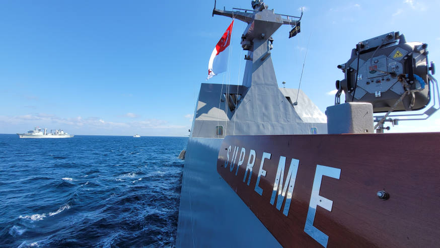 RSS Supreme (right) sailing in company with PLA(N)'s Luomahu (left) and Huangshan (centre) during a manoeuvring exercise, which involved the use of the Code for Unplanned Encounters at Sea (CUES).