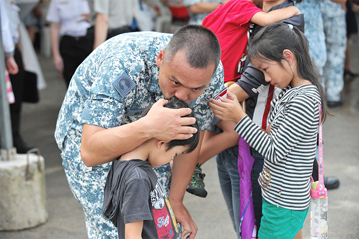 Singapore Navy soldier with his children