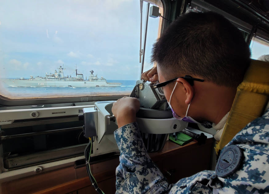 RSN personnel taking a bearing from FGS Bayern during the maneuvering exercise.