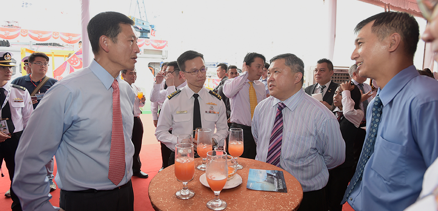 Mr Ong with past Commanding Officers of RSN's Patrol Vessel, RSS Unity.