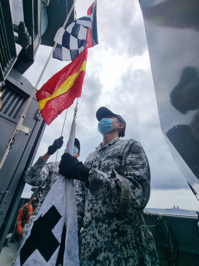Naval flags being hoisted during the communication exercise serial!
