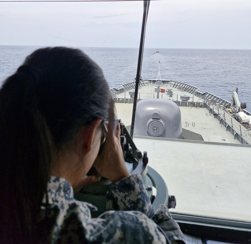 An Officer-of-the-Watch on board RSS Endeavour watching the bearing of KRI Sampari during the MANEX serial.