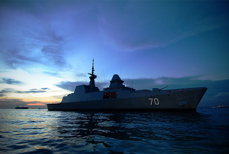 Singapore Navy Ship, RSS Steadfast 70 during sunrise